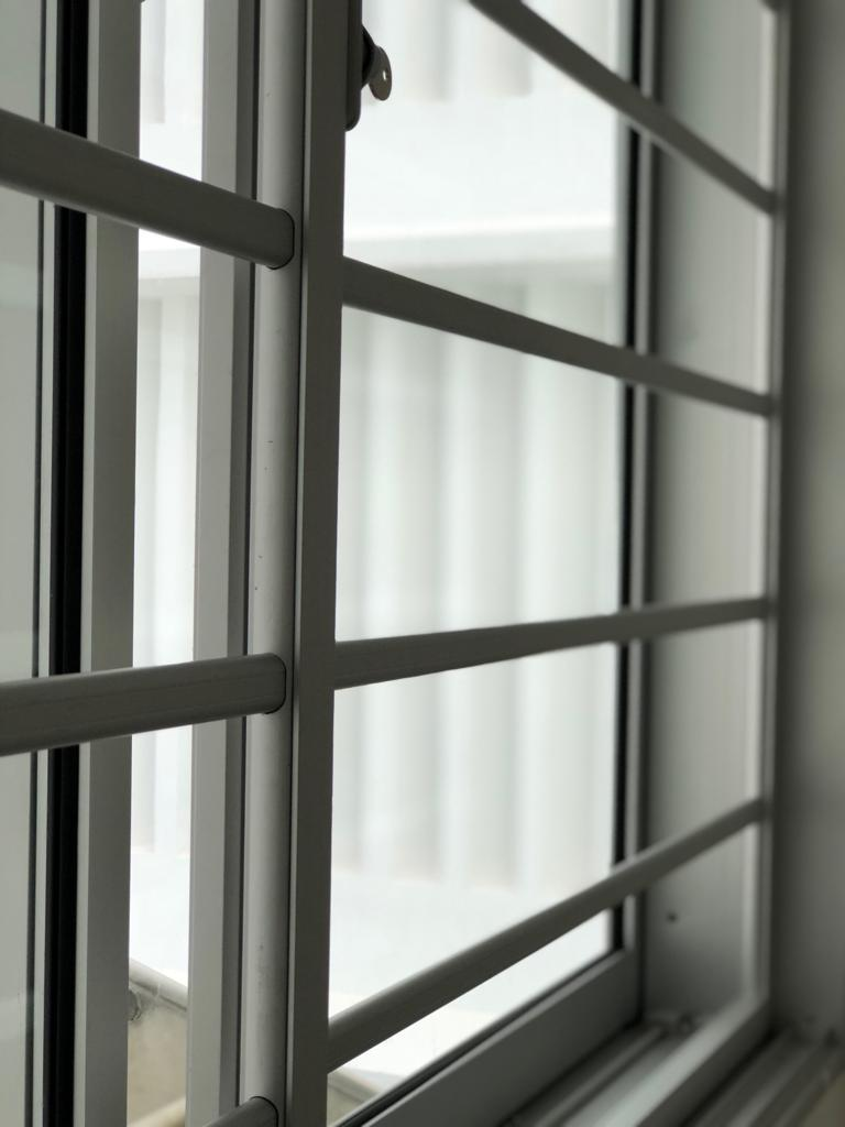 Aluminum window grille installation in Singapore