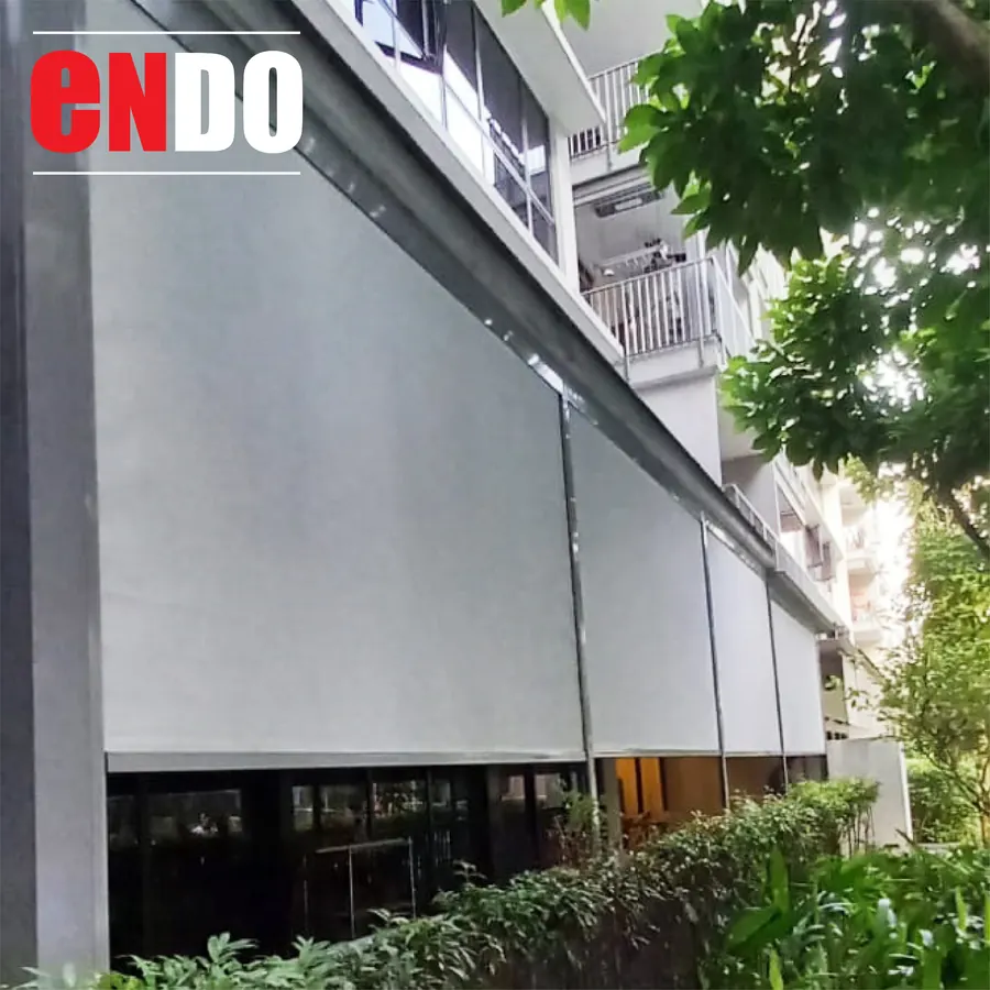 Motorized outdoor zip blind installed on HDB balcony for rain and sun protection