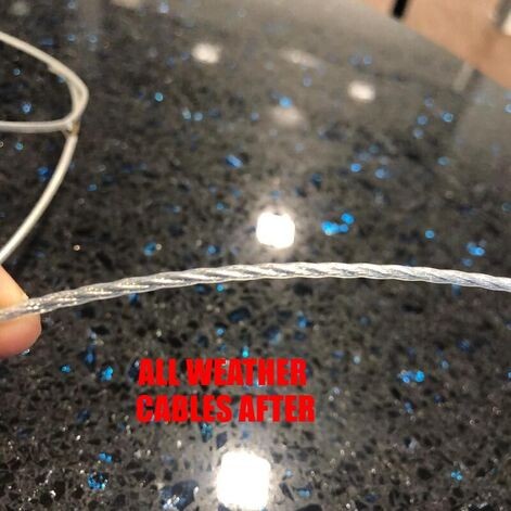 Close-up of All Weather Cable after burning test, showing minimal damage