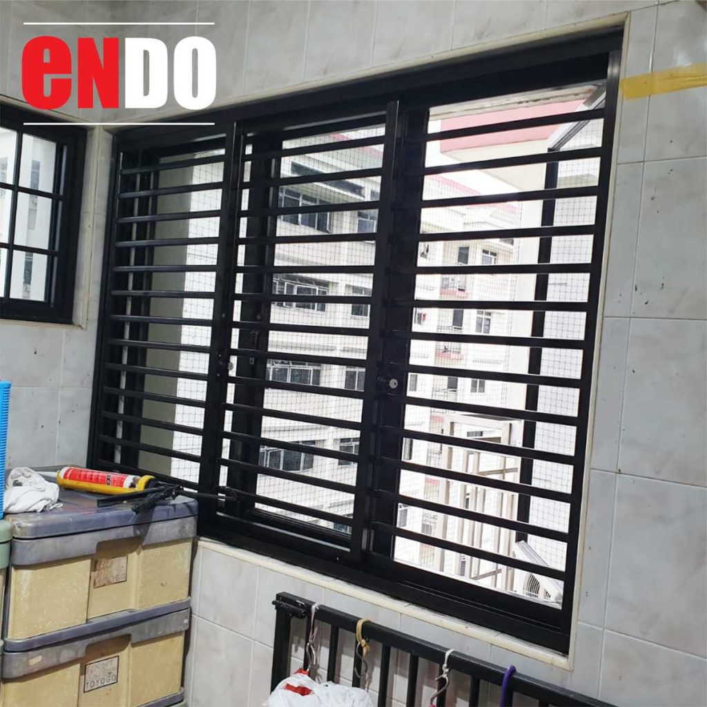 Close-up of aluminium grille bars in HDB service yard window