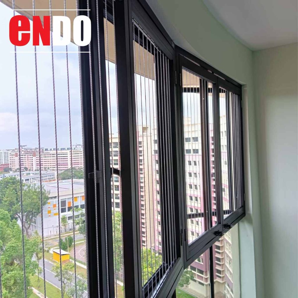Casement swing invisible grille installed on bay window, HDB estate view