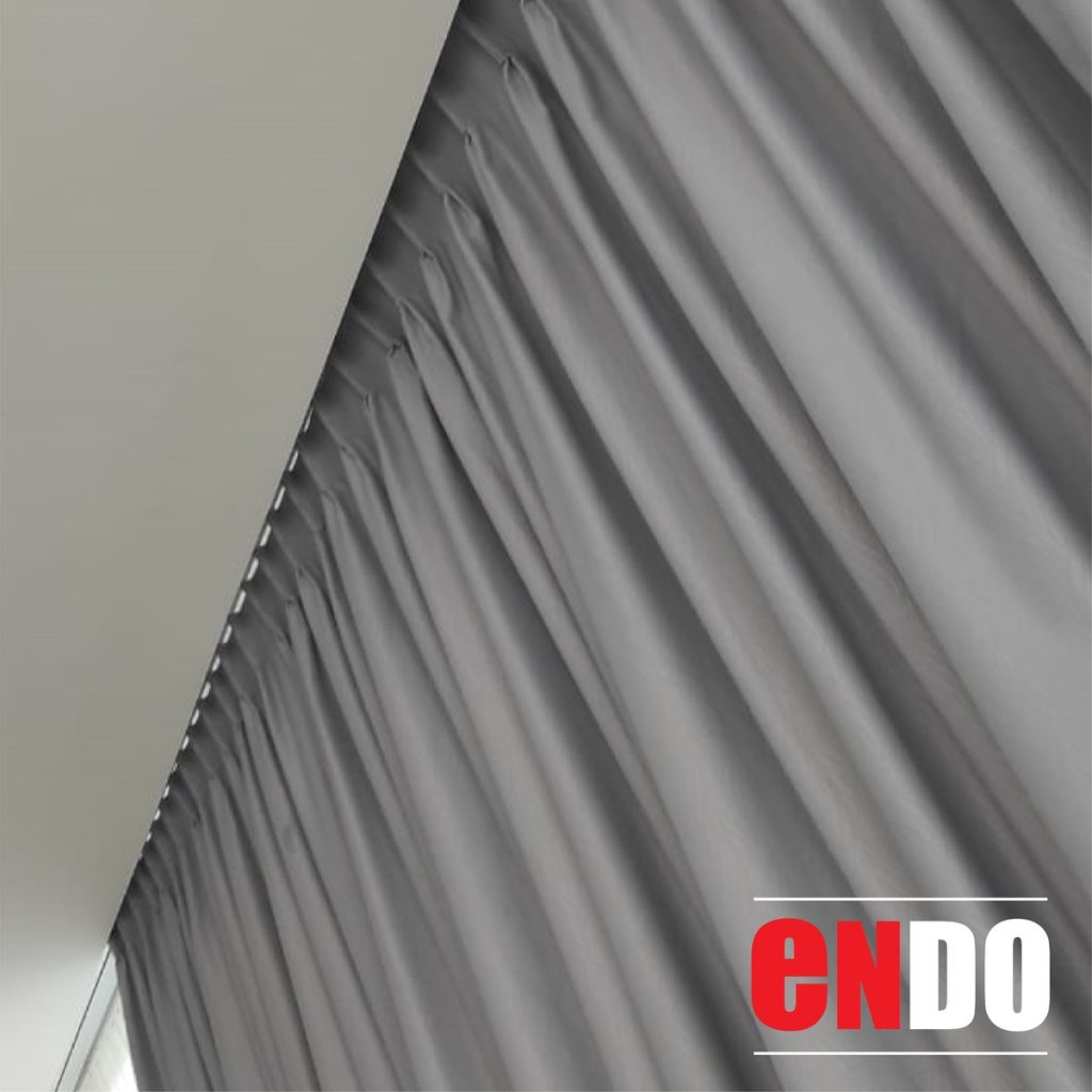 Day and night curtain grey fabric close-up showing double pleat fold detail