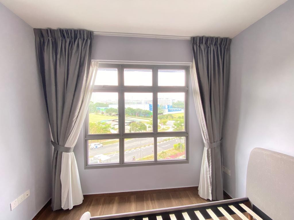 Day and night curtains with sheer day layer and brown blackout layer framing city view