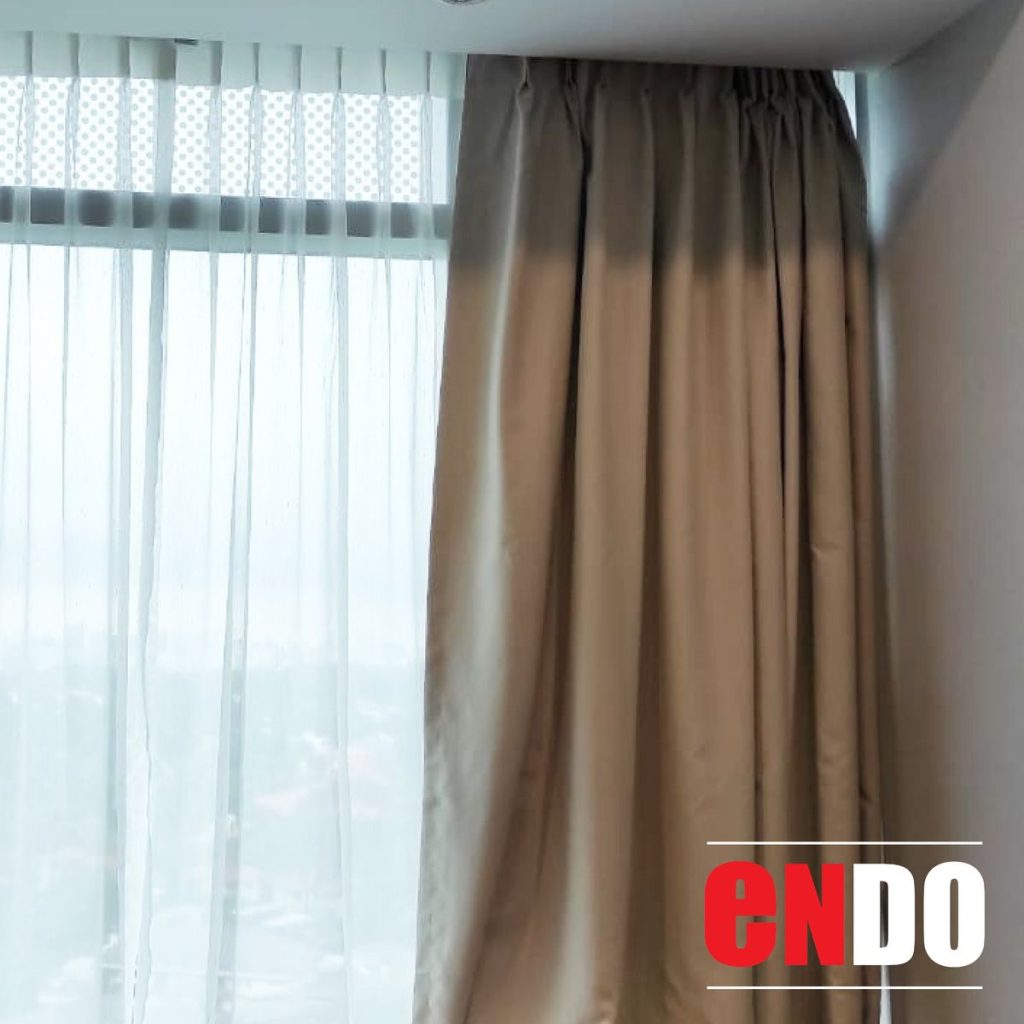 Day and night curtains with sheer day layer and brown blackout layer framing city view