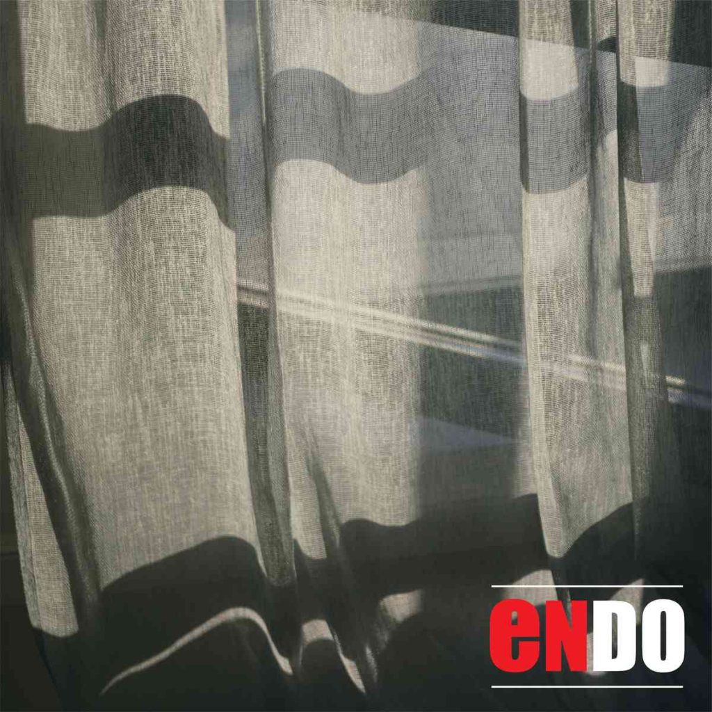 Close-up of sheer day curtain fabric with wave-shaped shadow
