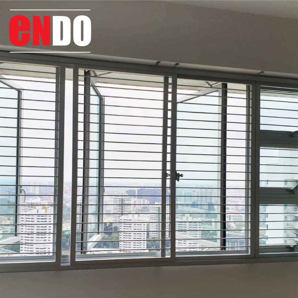 Sleek steel security grille on casement window with city view