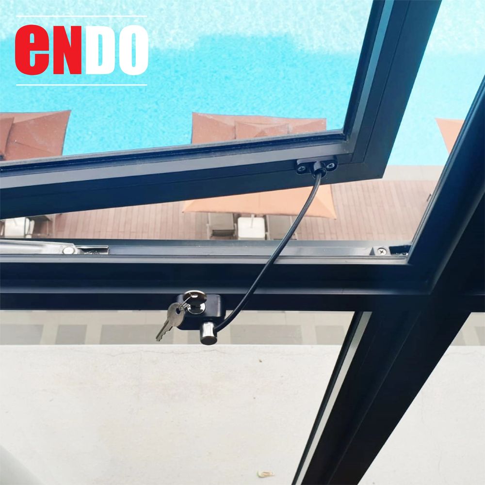 Ezi Lock V2 window restrictor installed on window overlooking condo poolside
