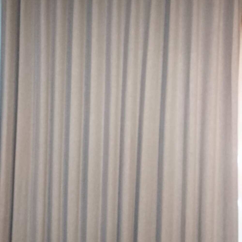 Memory Fold curtain close-up showing crisp permanent creases that hold their shape from top to bottom