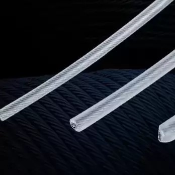 Close-up of nylon, teflon and all weathercoating on stainless steel invisible grille cable