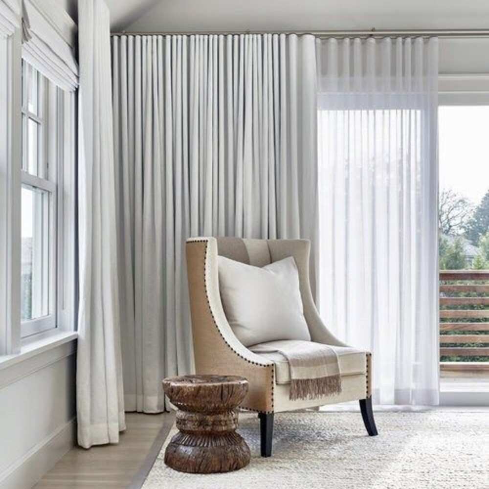 S Fold day and night curtains in a modern living room with sheer layer filtering natural light