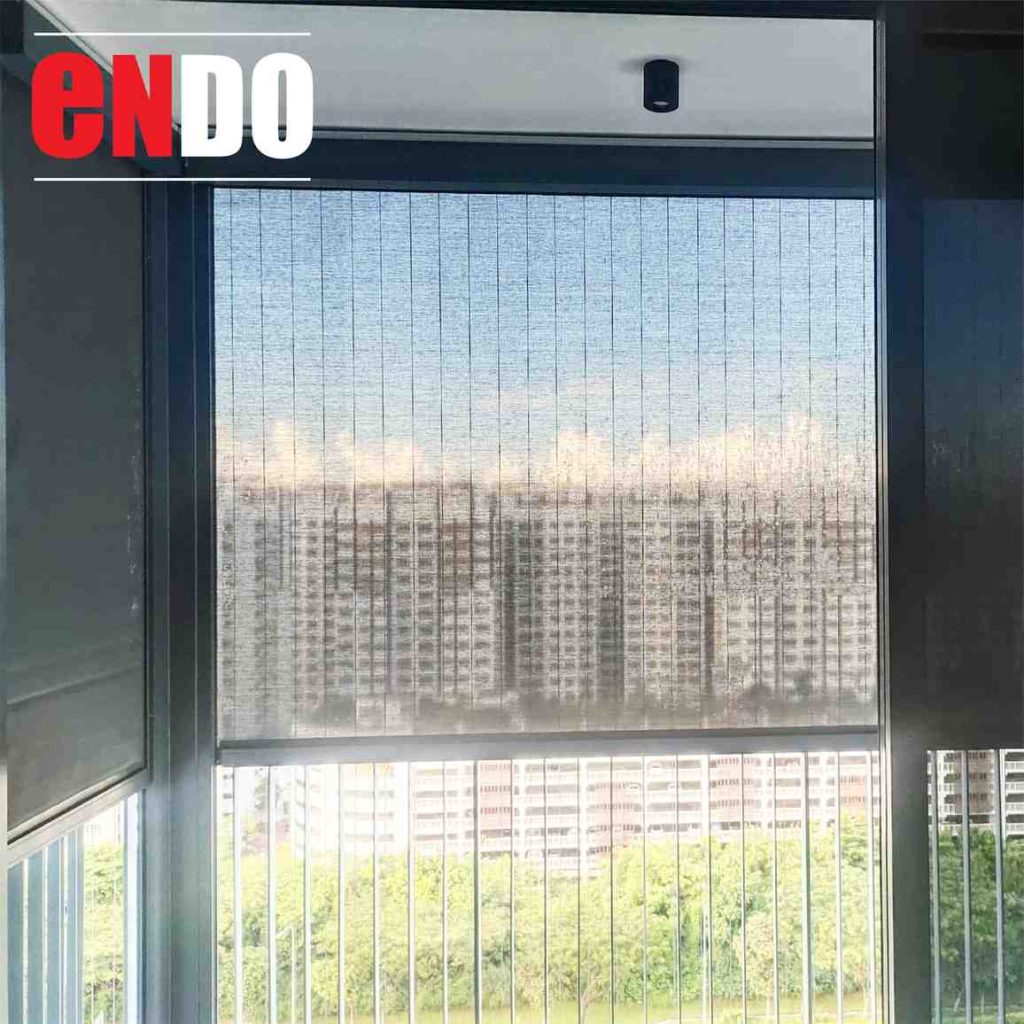 Close-up of dark sunscreen zip blind mesh fabric showing the fine weave texture with a soft outdoor view through it